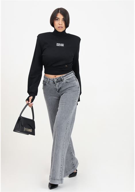 Jeans a vita bassa svasati grigi da donna con logo VERSACE JEANS COUTURE | 77HAB506CDW27909